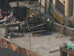 WS View of rooftop with three children running and playing / Lagos, Nigeria Stock Footage