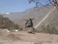 Aid helicopter landing. Kashmir, Pakistan Stock Footage