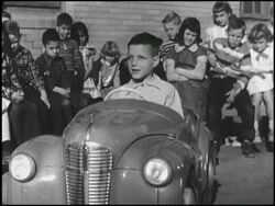 Montage; first graders practice driver safety Stock Footage