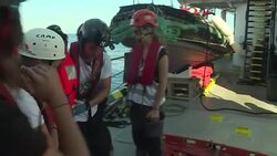 CLEAN : Seventeen dehydrated exhausted migrants rescued off Libya News Clip