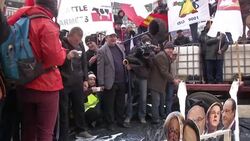 Dairy farmers dump milk over cutouts of European leaders to protest falling prices News Clip