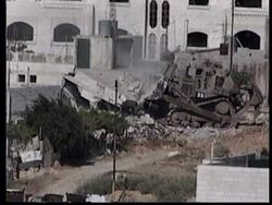 HEBRON: WEST BANK: ISRAELI TROOPS RAID MILITANT HAMAS HIDEOUT News Clip