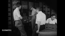 1946: July 16 1945 REPRISING: CONTROL SHACK: Physicist J. Robert Oppenheimer (1912-1985) talking w/ Physicist Isidor Rabi (1898-1988) saying 'stakes are really high' 'in 40 seconds we'll know.' Isidor Rabi calming him w/ encouraging words. Instructional Video