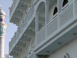 MS view of Architecture on Corniche with Mosque / Muscat, Oman Stock Footage