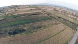 Aerial panorama over green fields farms summer Stock Footage