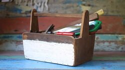 Grab the tools from the wooden toolbox Stock Footage