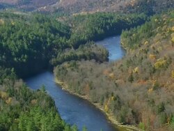 WS ARIEAL View of Meandering lake in forest /Maine, United States Stock Footage