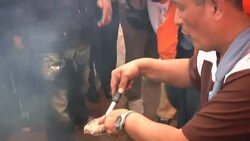 Cat meat served at annual religious festival Instructional Video