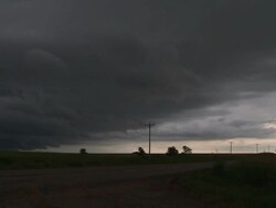 WS T/L View of dark storm over road / Oklahoma, United States Stock Footage