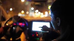 Young couple using a digital tablet to navigate through city streets. Stock Footage