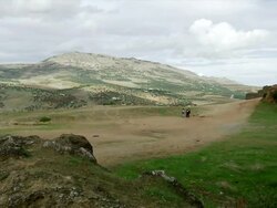 WS View of mountain countryside outside and children playing together / Fez, Fes-Boulemane, Morocco Stock Footage