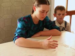 MS Woman separating rice / Manitoba Community, Close to Santa Cruz de la Sierra, Bolivia Stock Footage
