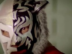Close up luchador 'Black Tiger'/ zoom out medium shot posing with flexed bicep/ Monterrey, Mexico Stock Footage