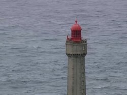 CU AERIAL ZO Shot of lighthouse / Brittany, France Stock Footage