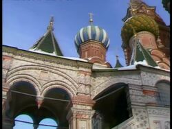 MS low angle panning right, Old Russian-style spires atop Cathedral of St. Basil, Moscow Stock Footage
