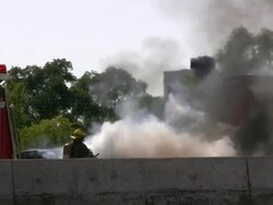 Firefighters, fire trucks on emergency site. Rescue mission, highway accident. Stock Footage