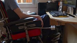 Disabled young man using computer Stock Footage
