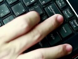 Typing fingers push notebook.Backspace Stock Footage