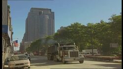 Trucks carrying debris from WTC site News Clip