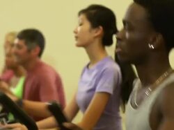 Diverse group running on Ellipticals Stock Footage