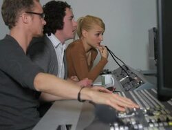 Producers working in television studio control room Stock Footage