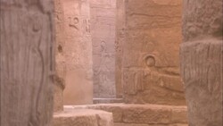 Egyptian carvings and hieroglyphics decorate the ruinous columns of Karnak Temple. Stock Footage