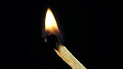 Igniting Matchstick Stock Footage