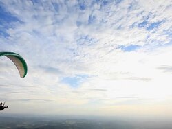 WS Shot of Para glider flying in air over mountain hill / Belo Horizonte, Minas Gerais, Brazil Stock Footage