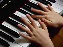 child playing piano Stock Footage