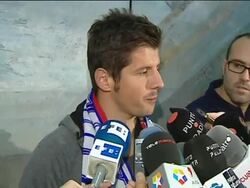 Emre lands in Madrid happy to be wearing Atletico Stock Footage