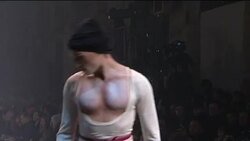 Sweaty dancers, Russian emigres at Galliano show News Clip