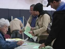 November 2, 2010 MS Arab voters signing in / Dearborn, Michigan, United States Stock Footage