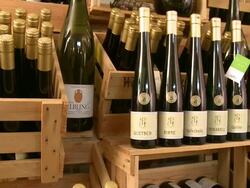 MS PAN View of bottles at brandy distillery / Fellerich, Rhineland-Palatinate, Germany  Stock Footage