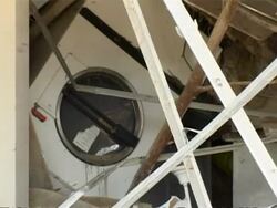 Zoom out to MS Post Boxing Day 2004 Tsunami, building wreckage, Anantara, Thailand Stock Footage