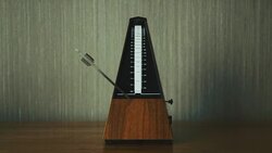Metronome on Wooden Table Stock Footage