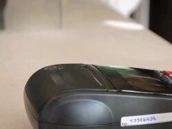 Dolly Shot of Women Swiping A Credit Card Stock Footage