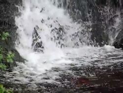 MS SLO MO Shot of water falls with rocks in buenavista del norte / Tenerife Island, Canary Islands, Spain Stock Footage