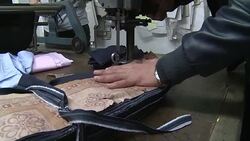 CLEAN : Gaza firm turns out Jewish skullcaps in quest for orders News Clip