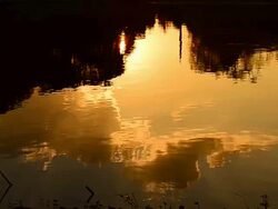 Wave Pattern on the Water with Sunset Reflection Stock Footage