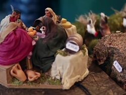 CU Shot of artisan made presepio figurines for nativity scenes in historical Christmas Market of Piazza Novena / Rome, Italy Stock Footage