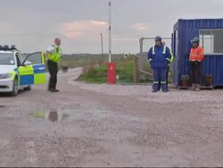 Protesters at fracking drill site News Clip