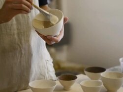 CU TU Shot of Potter women are painted bowl glaze / Kyoto, Japan Stock Footage