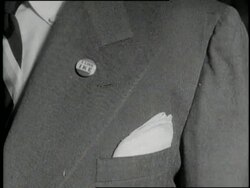 Lapel pins and signs announce I Like Ike during the 1952 Republican National Convention. News Clip