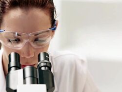 HD: Female Scientist Working with microscope Stock Footage