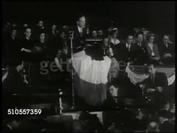 1939: U.S. AMERICA FIRST COMMITTEE RALLY: LA MS Marquee 'Manhattan Center,' New York. INT VS Pilot Charles A. Lindbergh (1902-1974) speaking at AFC rally '... we should consider the future of the United States & the Western Hemisphere...' WWII Instructional Video
