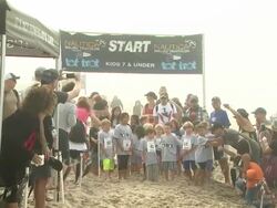 ATMOSPHERE - Kids at Tot Trot Nautica Malibu Triathlon Presented by Equinox on 9/8/13 in Malibu, CA. Stock Footage