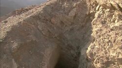 The cave entrance of an abandoned emerald mine remains in a rocky mountain in Sikait, Egypt. Stock Footage