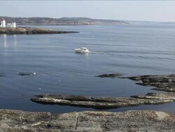Small boat passing. Stock Footage