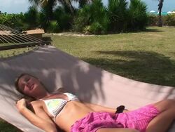 Blond girl sleeping on an hammock Stock Footage