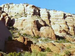 WS PAN Red rock mountains to Chapel of Holy Cross church built into side of red rock mountain / Sedona, Arizona, USA Stock Footage